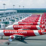 Maskapai Penerbangan Menghadapi Tantangan: AirAsia Hapus Rute Langsung dan Fokus pada Efisiensi