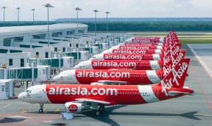 Maskapai Penerbangan Menghadapi Tantangan: AirAsia Hapus Rute Langsung dan Fokus pada Efisiensi