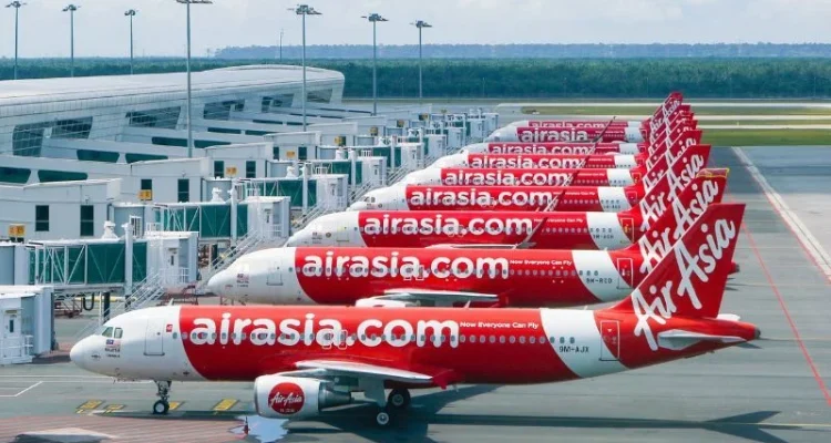 Maskapai Penerbangan Menghadapi Tantangan: AirAsia Hapus Rute Langsung dan Fokus pada Efisiensi
