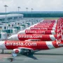 Maskapai Penerbangan Menghadapi Tantangan: AirAsia Hapus Rute Langsung dan Fokus pada Efisiensi